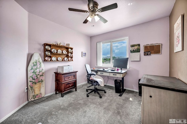 office with light carpet, a ceiling fan, and baseboards