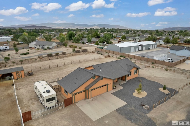 bird's eye view with a residential view and a mountain view