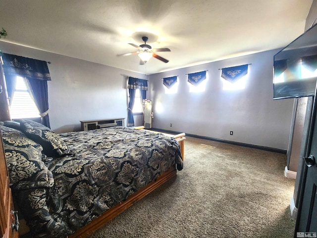 bedroom featuring carpet floors, ceiling fan, and baseboards