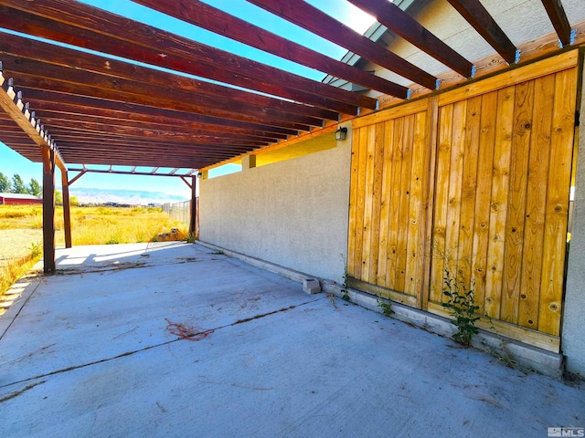 view of patio featuring a carport