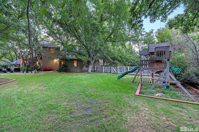 view of yard featuring a playground