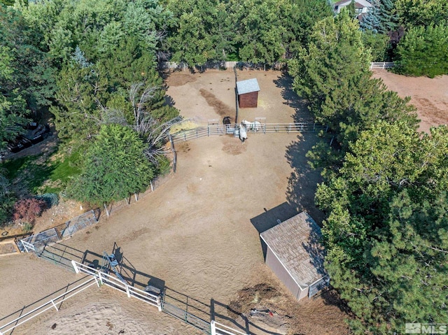 birds eye view of property featuring a rural view