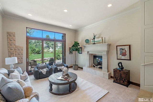 living room with a fireplace, ornamental molding, and light colored carpet