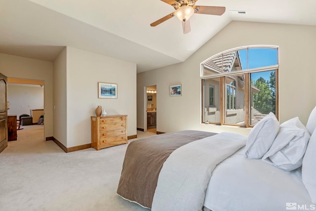 carpeted bedroom featuring ceiling fan, lofted ceiling, connected bathroom, and access to exterior