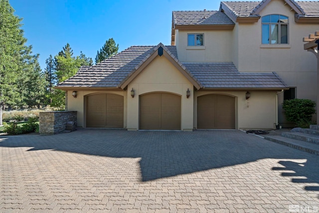 view of front of property with a garage