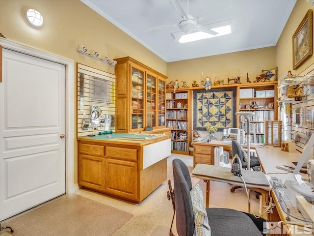 office featuring crown molding and ceiling fan