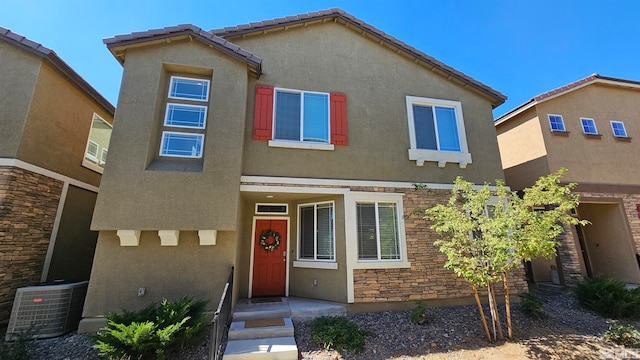 view of front of home featuring central AC