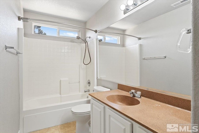 bathroom with visible vents, toilet, tub / shower combination, a textured ceiling, and vanity