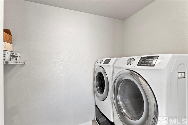 laundry room featuring independent washer and dryer