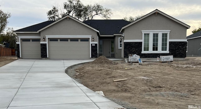 ranch-style home with a garage