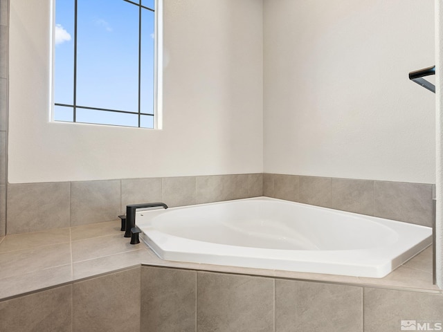 bathroom featuring a garden tub