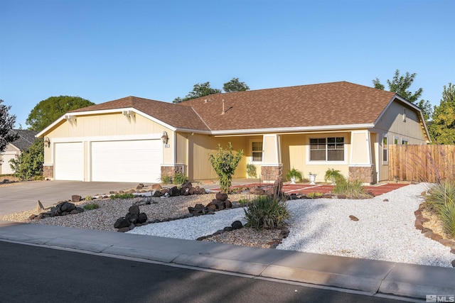 ranch-style house featuring a garage