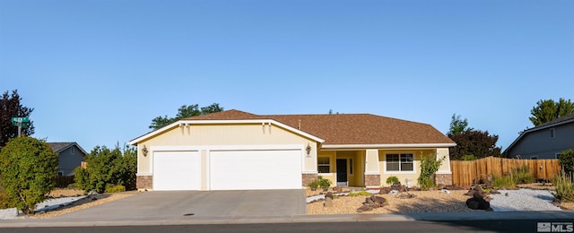 single story home featuring a garage