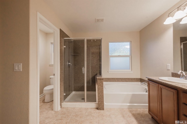 full bathroom featuring toilet, tile patterned floors, vanity, and independent shower and bath