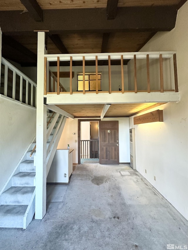 interior space with unfinished concrete floors