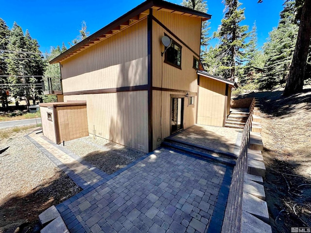 view of home's exterior featuring a patio area