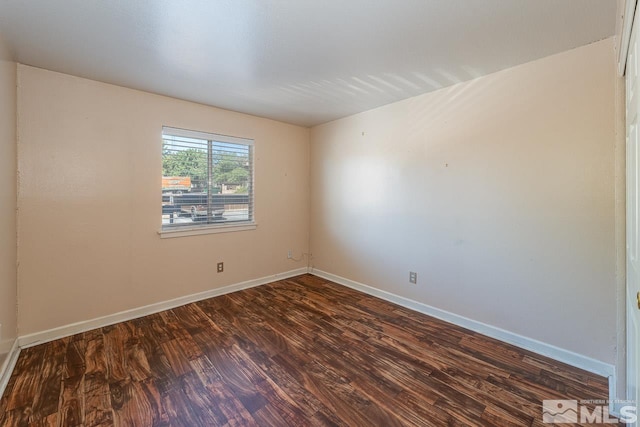 spare room featuring hardwood / wood-style flooring