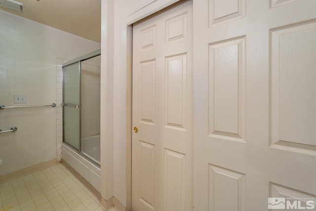 bathroom featuring tile patterned flooring