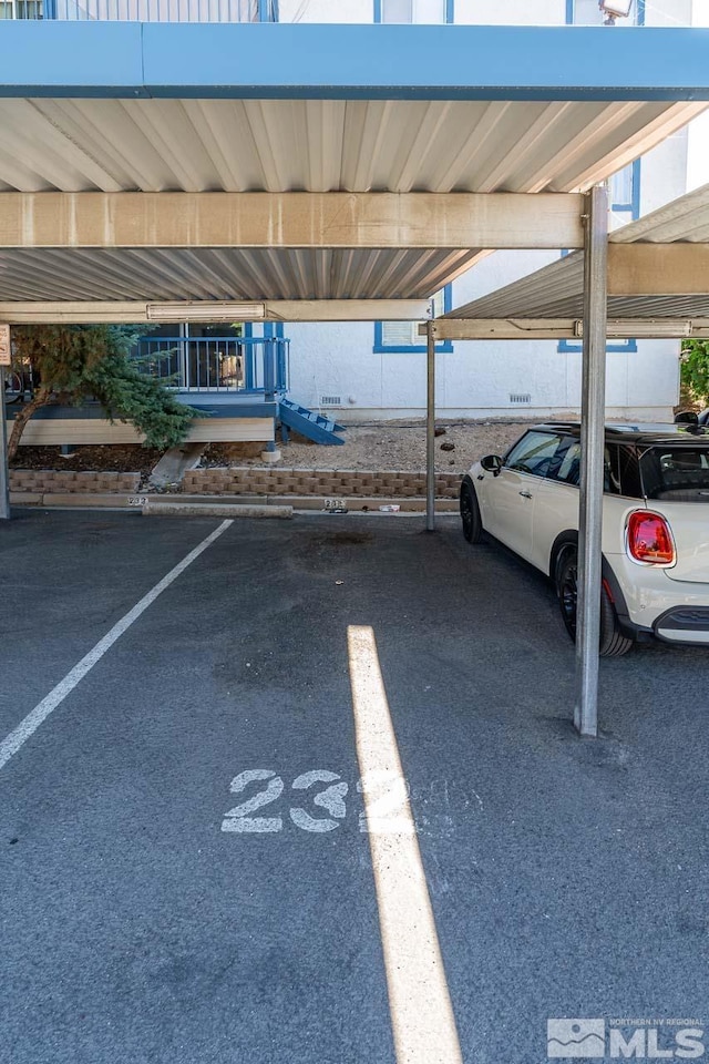 view of parking featuring a carport