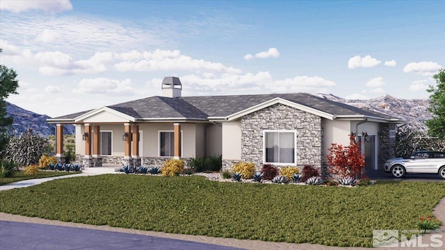 view of front of house featuring a front lawn and a mountain view