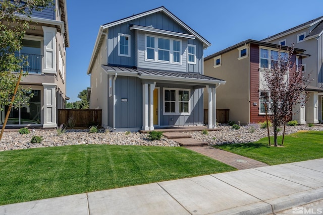 view of front of home with a front lawn