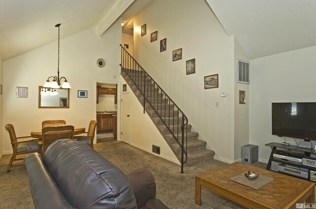 carpeted living room featuring high vaulted ceiling and an inviting chandelier