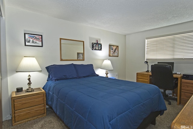 carpeted bedroom featuring a textured ceiling