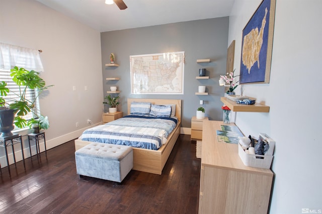 bedroom featuring ceiling fan and dark hardwood / wood-style flooring