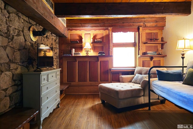sitting room featuring hardwood / wood-style floors, wood ceiling, and beam ceiling