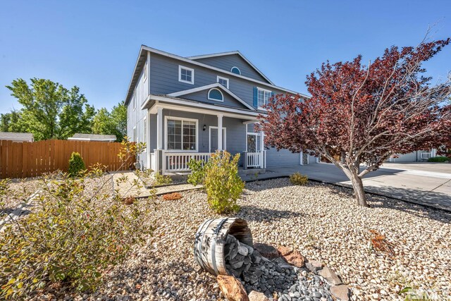 front of property featuring a garage and a mountain view