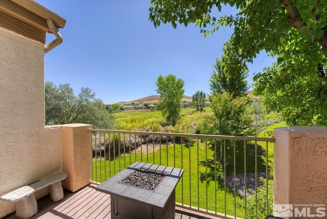 balcony with a fire pit