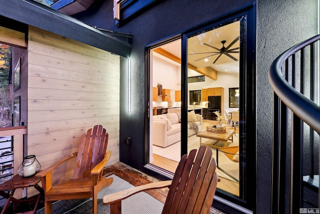 exterior space featuring a balcony and stucco siding