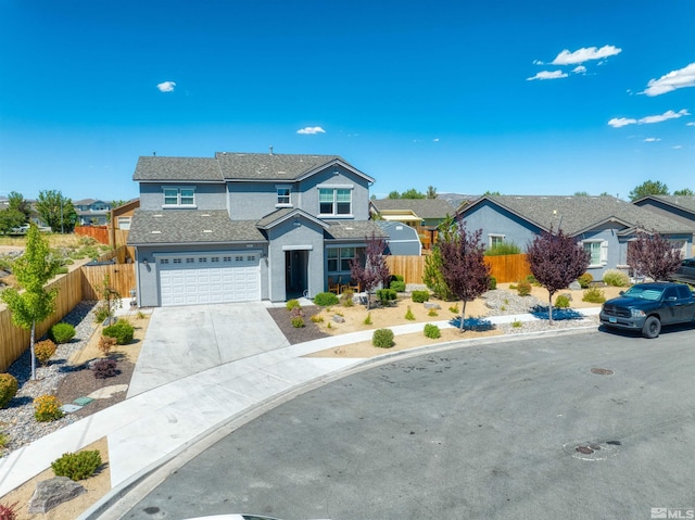 front of property with a garage