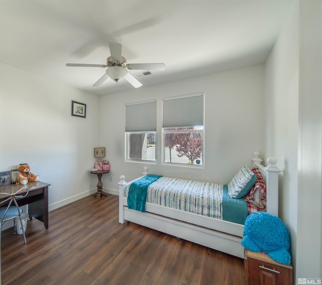 bedroom with ceiling fan and wood-type flooring