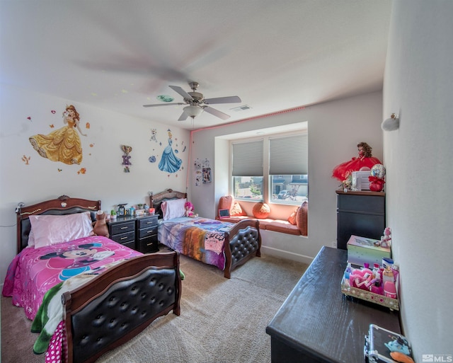 bedroom with ceiling fan and light carpet