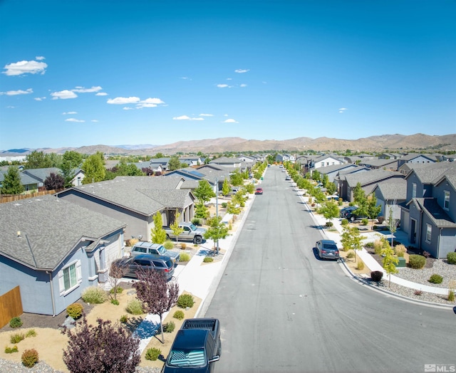 birds eye view of property featuring a mountain view