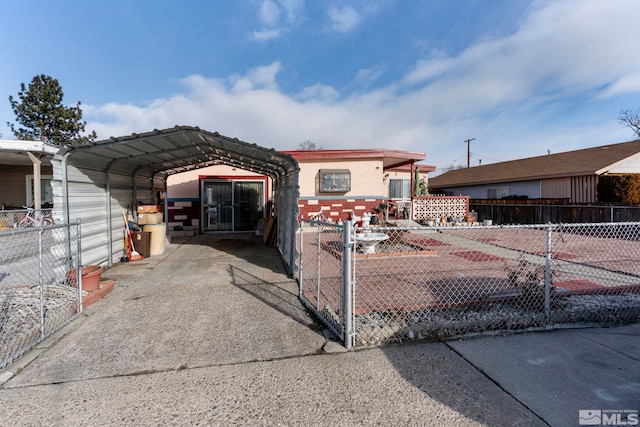 view of front of house featuring a carport