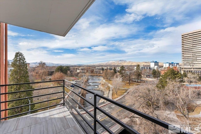 balcony featuring a mountain view