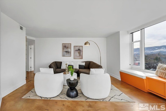 living room featuring a mountain view