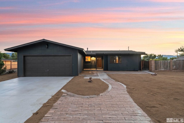 view of front of home with a garage