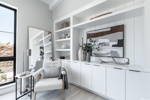 living area with light hardwood / wood-style floors