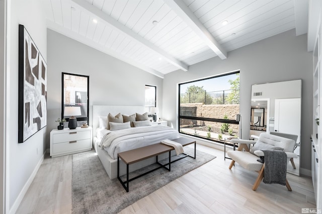 bedroom with high vaulted ceiling, beamed ceiling, light hardwood / wood-style floors, and wood ceiling