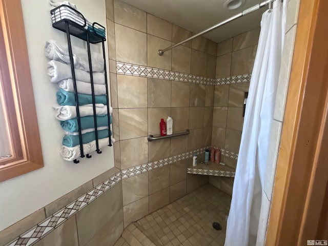 bathroom with a shower with shower curtain