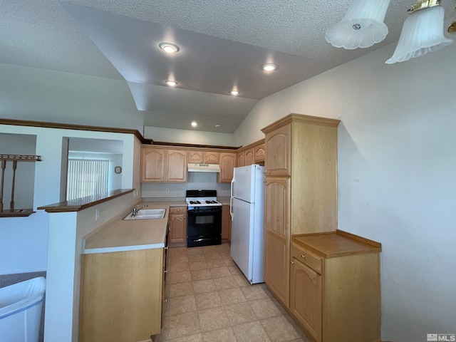 kitchen featuring sink, lofted ceiling, kitchen peninsula, white appliances, and light tile patterned flooring