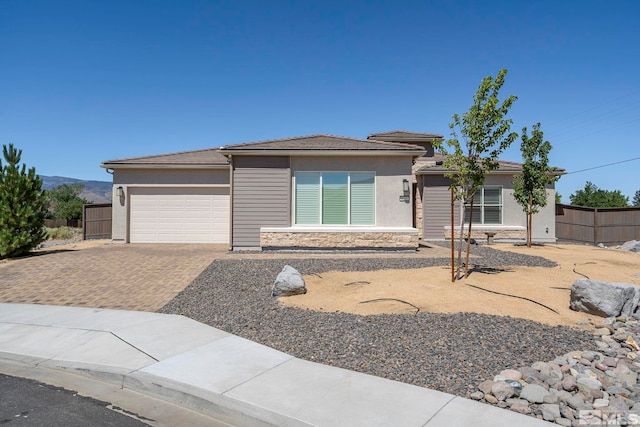 view of front of property with a garage