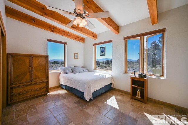 bedroom with tile patterned flooring, ceiling fan, and beamed ceiling