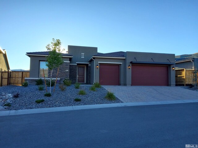 view of front of home featuring a garage