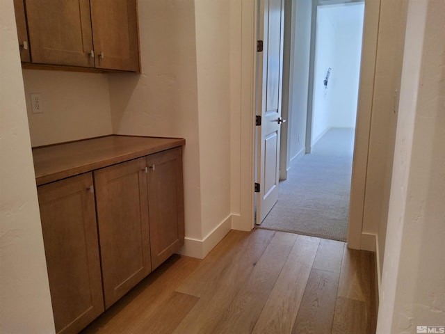 hall featuring light wood-type flooring