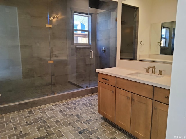 bathroom featuring vanity and walk in shower