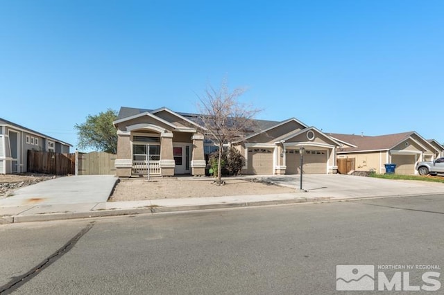 view of front of property featuring a garage